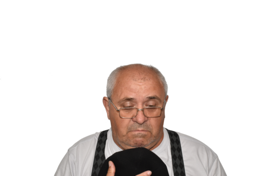 Portrait of an elderly man with a guilty expression on his face. He will regret something very much.