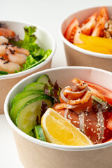 Tasty take out poke bowls isolated on white background