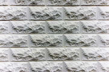 concrete slab with light gray brick imitation texture background