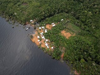 Naklejka premium Beautiful aerial view to small amazon riverside community