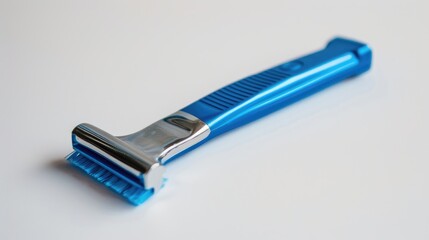 Disposable blue razor for leg hair shaving on white background