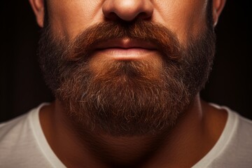 Obraz premium Well-defined beard and mustache on a black granite background