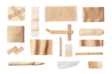 Assorted adhesive bandages in various shapes and sizes on a white background, ideal for first aid and medical illustrations.