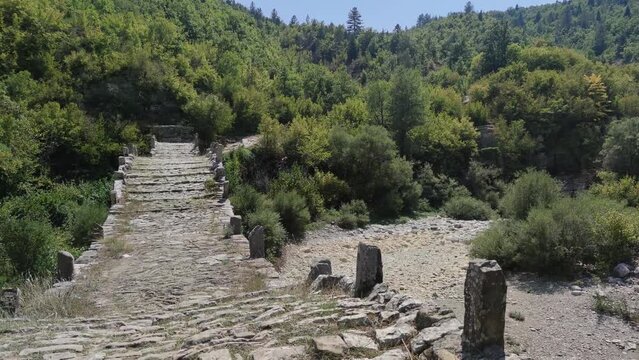 Amazing  view of Medieval Plakidas (Kalogeriko) Bridge at Pindus Mountains, Zagori, Epirus, Greece
