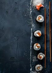 Sushi composition on black background. The Art of Japanese Cuisine. Food photography for menu and sushi bar decoration