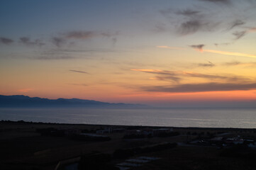 Sunset Sky over Sea Horizon in the Evening with colorful clouds Orange sunligh 1
