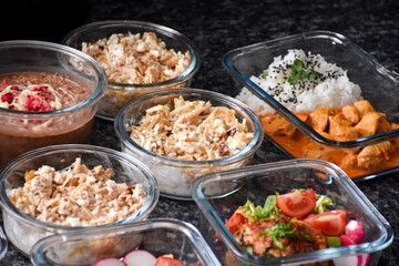 Glass boxes with food for the day