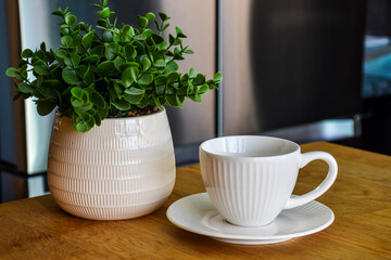 Ceramic white mug with saucer