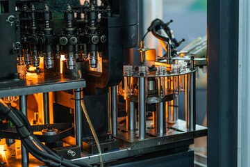 Fully automated production of plastic beverage bottles