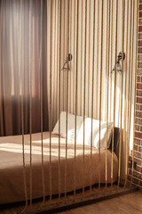 Loft interior of tiny studio appartment. Modern bedroom and kitchen in tiny home