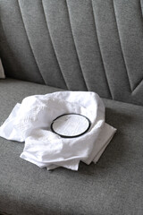 White Embroidery Hoop With Geometric and Floral Patterns. Process of creating Traditional ukrainian embroidery.