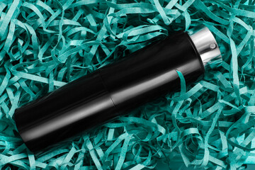 Perfume on shred paper