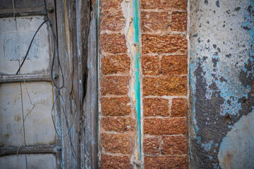 old brick wall with window