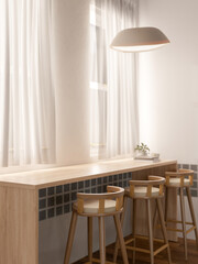 A cozy minimalist coffee shop seating area features a long wooden table against the window.