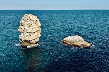 Rocks in the Black Sea on a sunny day in Tyulenovo, Bulgaria.