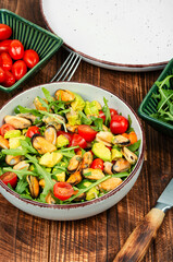Salad with mussels.
