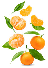 flying mandarins with green leaves and slices isolated on white background. clipping path