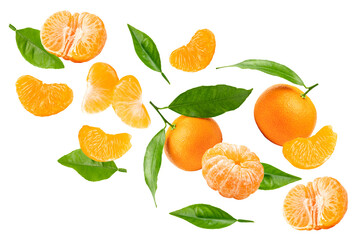 flying mandarins with green leaves and slices isolated on white background. clipping path