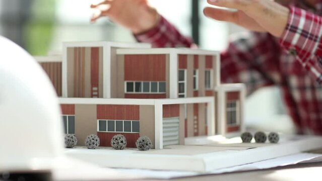 Virtual reality futuristic design technology. Architect or design engineer in VR headset for BIM technology designing a 3D model