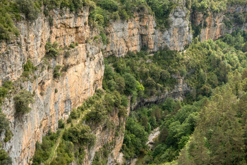 tree lined rock outrcrops and glacial formations, gorges and canyons in mountains, Spain