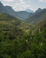 Obraz premium a winding mountain road twisting through a canyon in the Spanish pyrenees