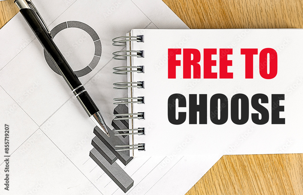 Aufkleber free to choose text on notebook with chart on wooden background