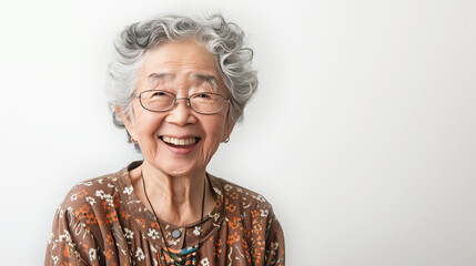 Happy elderly lady with copy space