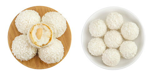 round candy raffaello with coconut flakes and nut in wooden and ceramic bowl isolated on white background