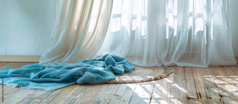 Poster white linen curtains and blue blanket above rug on wooden floor. with copy space image. place for ad