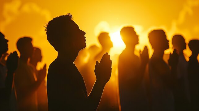 Silhouette group of Christians worshipping