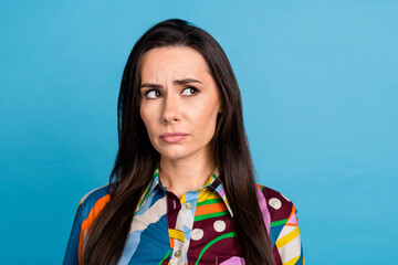 Photo of attractive young woman look sad skeptical empty space dressed stylish colorful print...