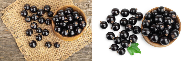 Black currants in bowl on burlap and wooden background and isolated on white background. Top view. Flat lay