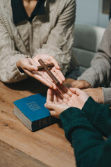 Christians are congregants join hands to pray and seek the blessings of God.