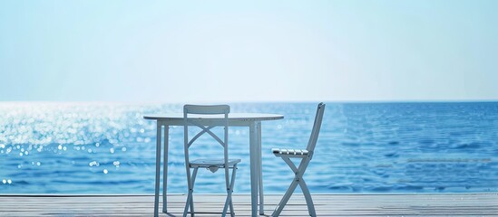 Obraz premium White table and chair isolated on white background. with copy space image. Place for adding text or design