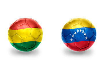 Fototapeta premium football balls with national flags of venezuela and bolivia ,soccer teams. on the white background.