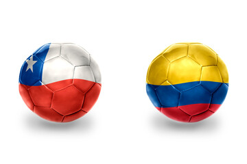 Obraz premium football balls with national flags of colombia and chile ,soccer teams. on the white background.