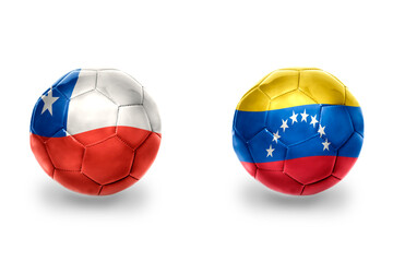 Fototapeta premium football balls with national flags of venezuela and chile ,soccer teams. on the white background.