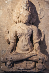 Hindu god stone carving sculpture found in a temple, Udaipur, Rajasthan, India