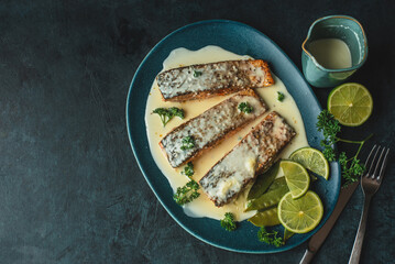 Fried salmon fish with cream sauce
