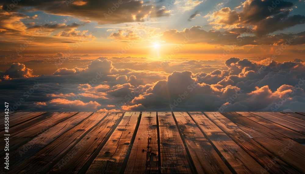 Poster wooden table top with view of sunset above the clouds. product display background