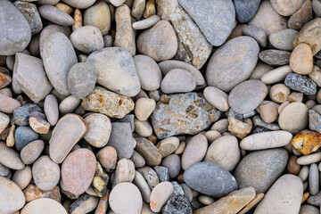 pattern of sea stones on the beach