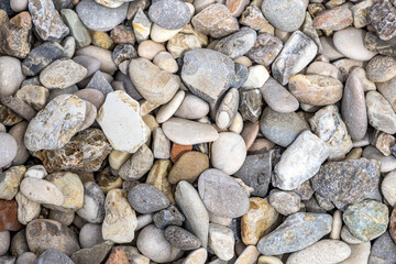 pattern of sea stones on the beach