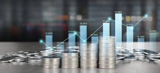 Stack of coin with trading graph, financial investment concept