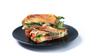 Healthy spinach, tomato and cheese sandwich isolated on white background