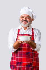 Portrait of Indian asian elderly senior old male chef or professional cook