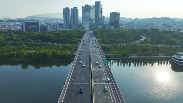 Drone View of Seoul city in South Korea, Yanghwa large bride, Han River, Summer, 60fps