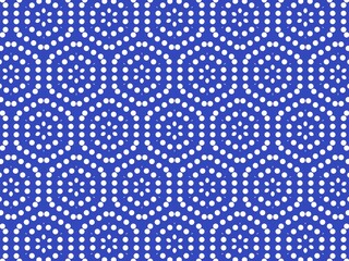 A classic blue and white polka dot pattern background 