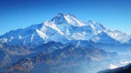 Snow-capped peaks under a clear blue sky