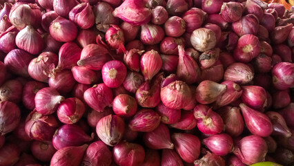 Fresh Red Onions on the market display
