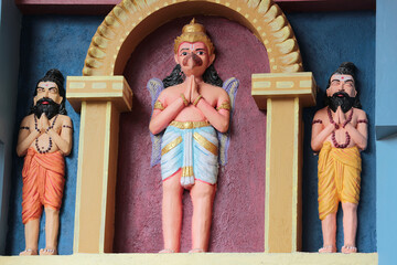 Garuda is the servant of Vishnu. Figure on a Hindu temple in South India.